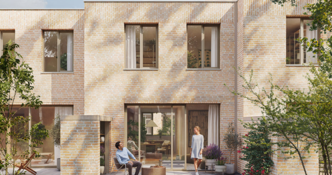 Woonproject Het Porfier in Sint-Amandsberg (Gent): autoluw wonen rond een gedeeld binnenerf en parktuin.