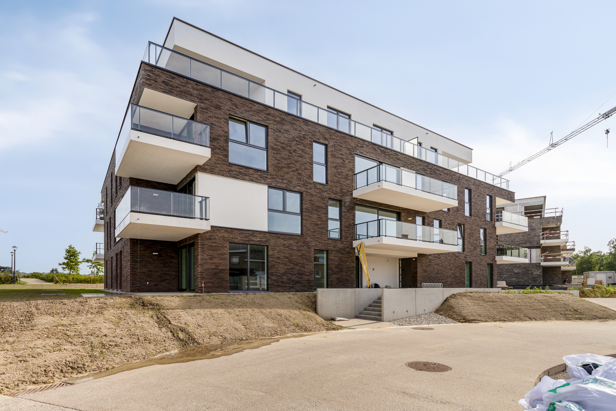 Residentie Zelus in Ronse: instapklare 2-slaapkamerappartementen met terras of tuin in De Stadstuin.